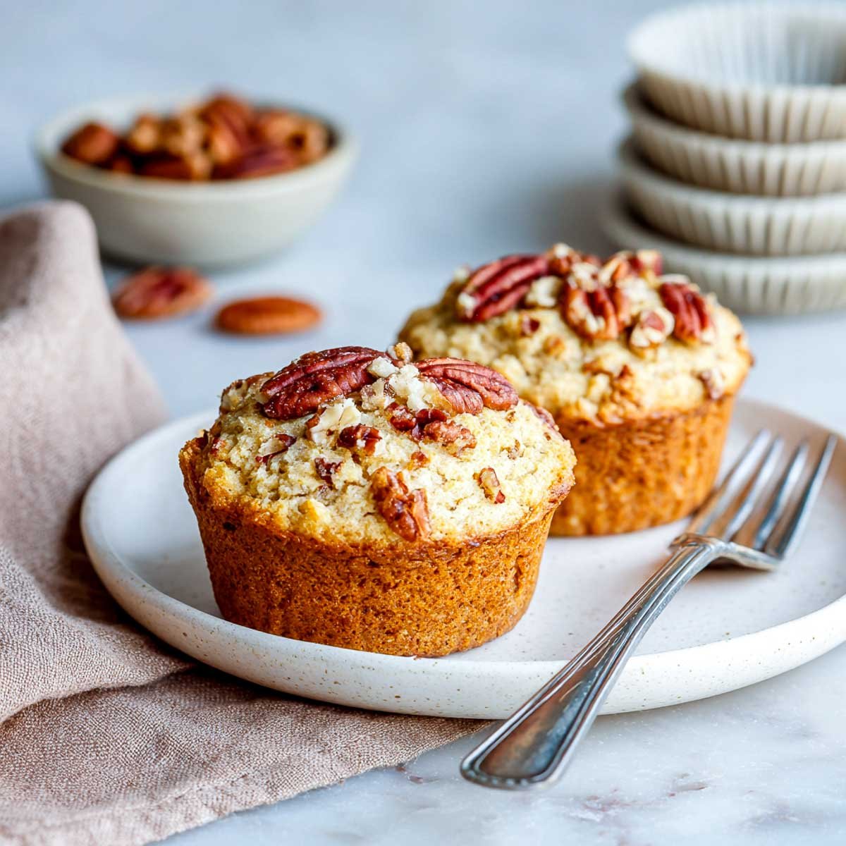 Golden maple pecan muffins with cottage cheese and crisp tops.