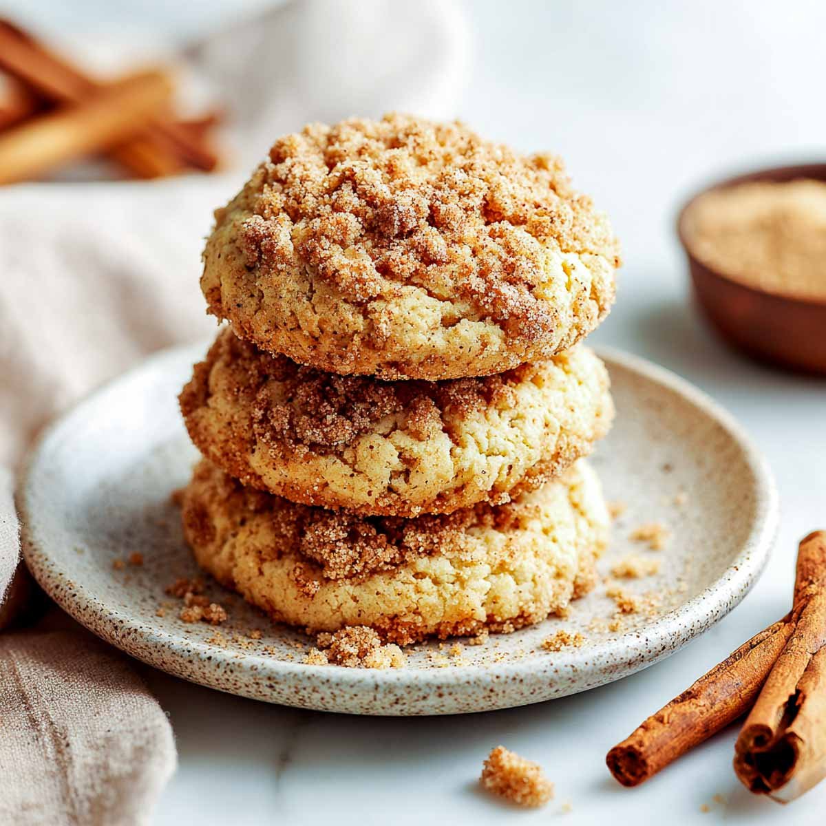 Side view of vegan coffee cake cookie with cinnamon crumb topping.