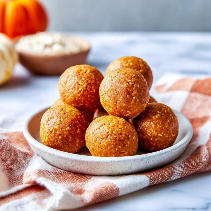 Cottage cheese pumpkin protein bites on a small plate.