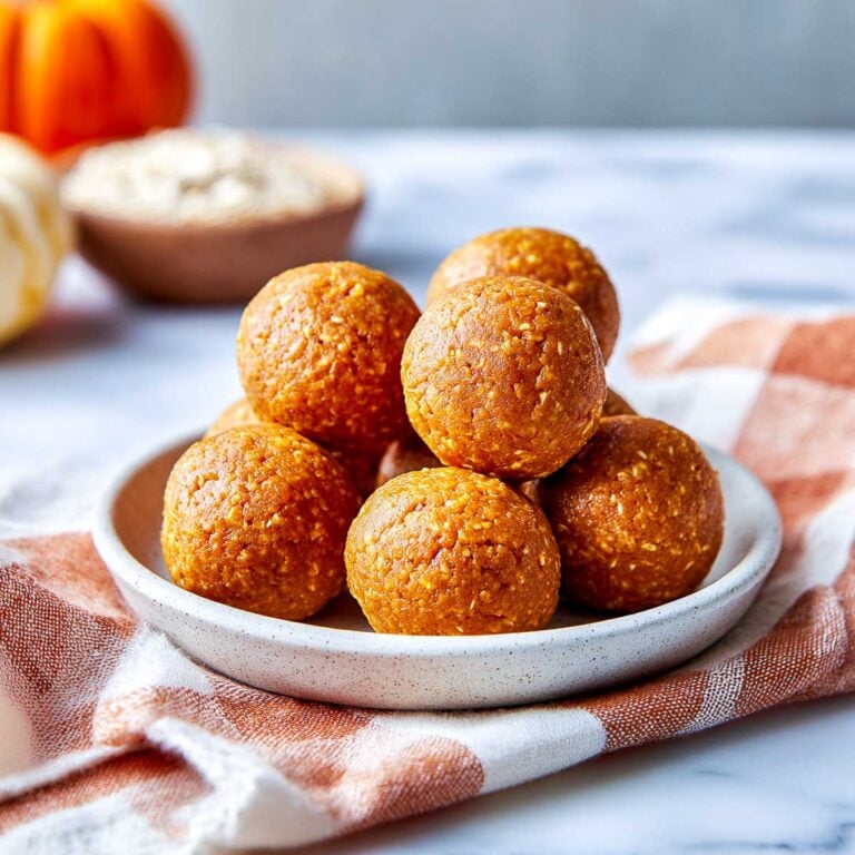 Cottage cheese pumpkin protein bites on a small plate.