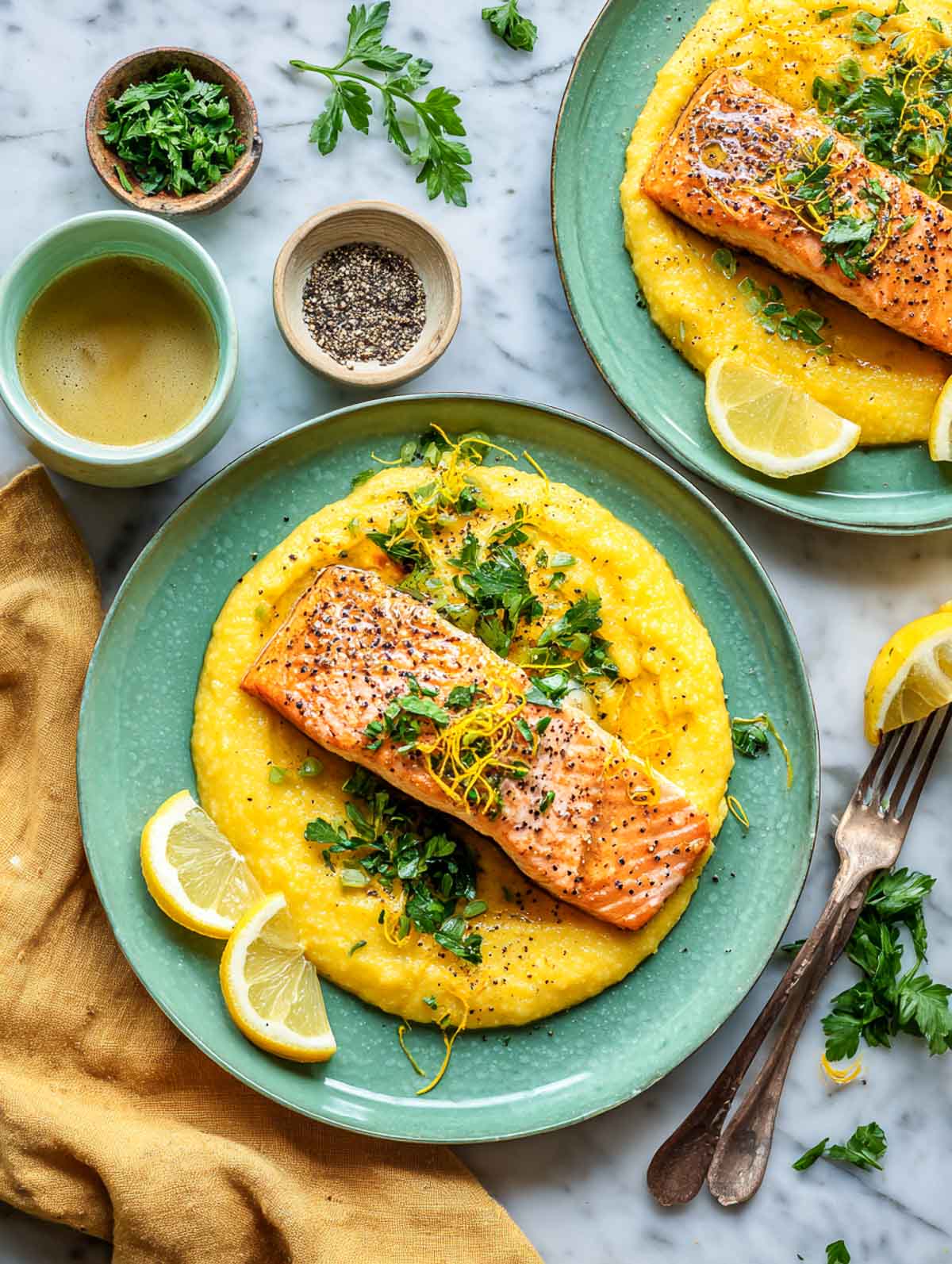 Lemon-dill salmon fillets served over mashed potatoes with crispy shallots.