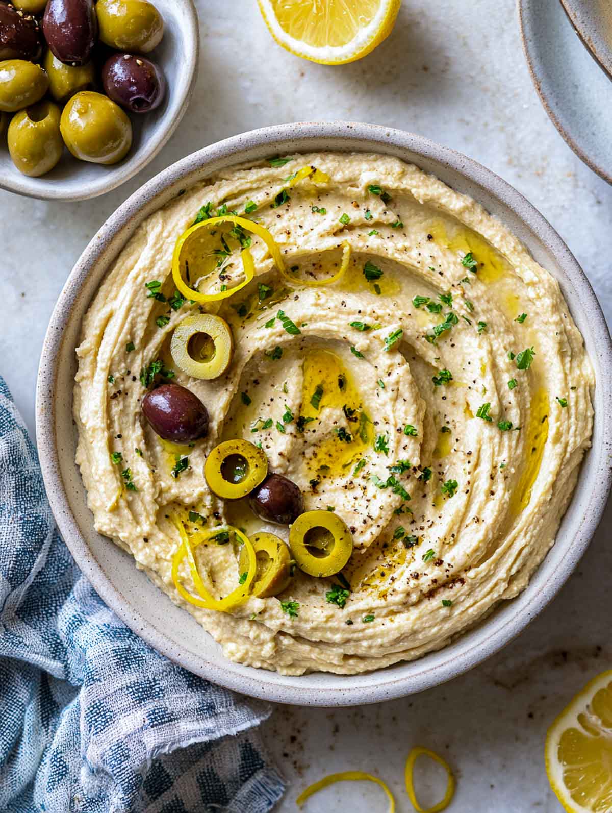Creamy cannellini bean and olive dip with lemon and olive oil.
