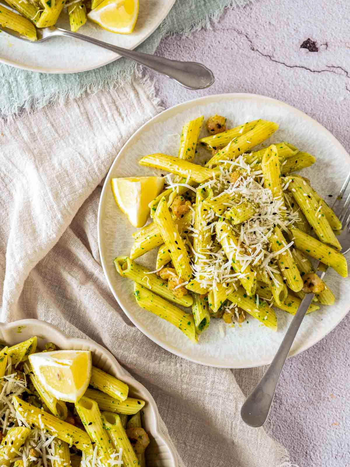 Garlic butter shrimp pasta served on a white plate.