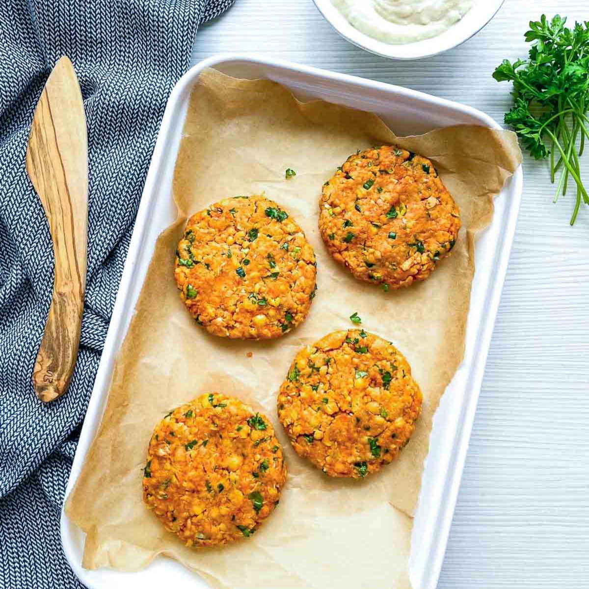 Falafel mixture with spices and herbs in bowl