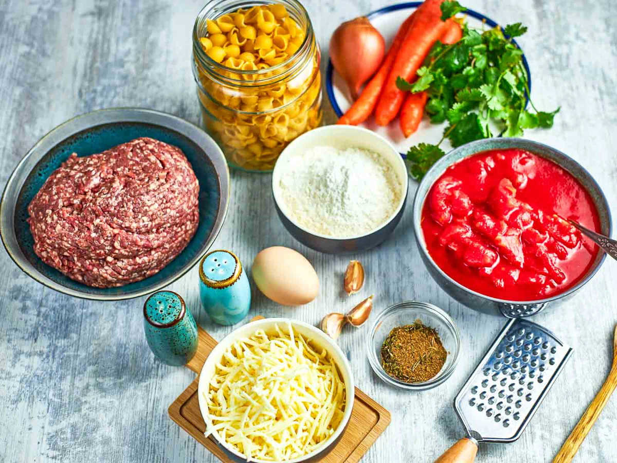 Italian meatball soup ingredients on table